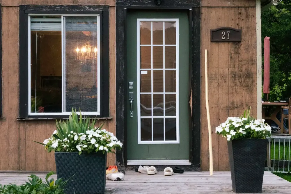 Glazed front door and window of a house – locksmith Harborne advice on locks for glazed timber doors from Locksmith Birmingham
